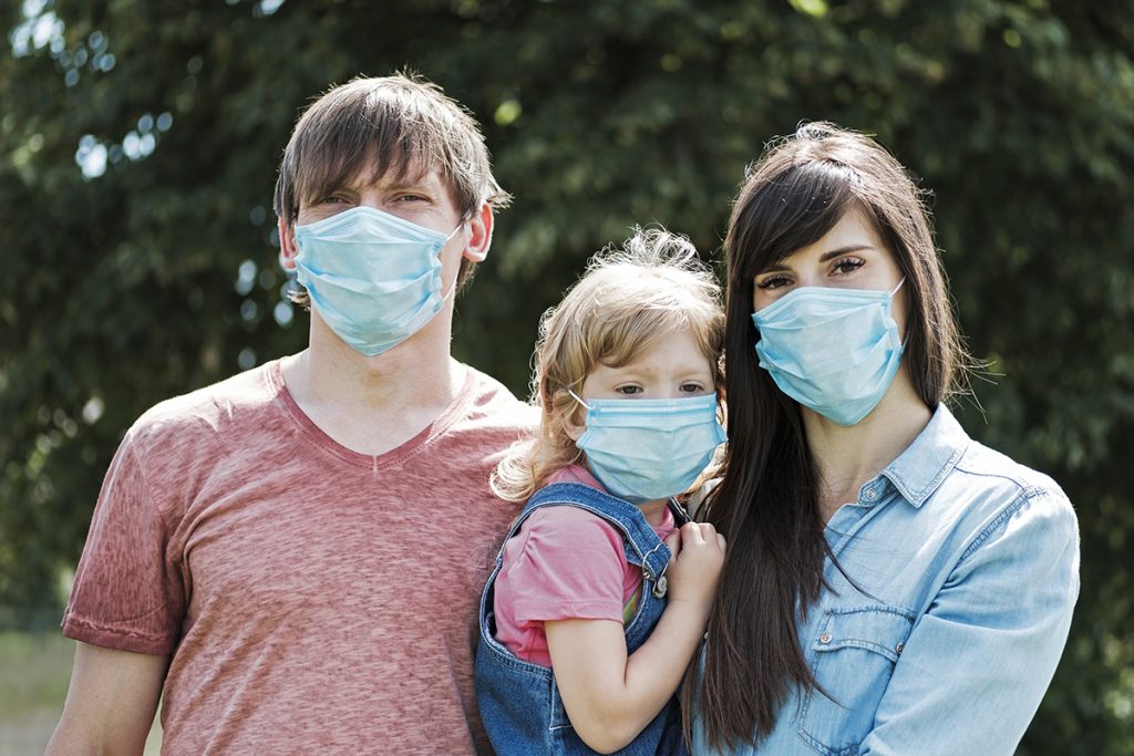 family wearing face masks